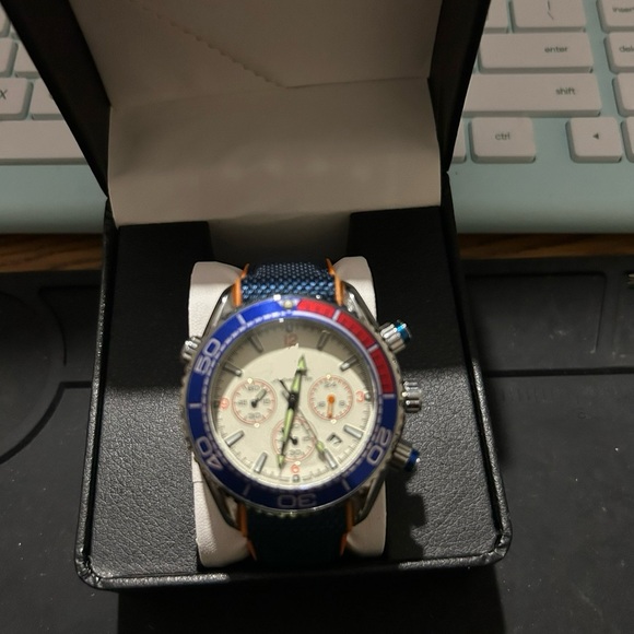 Blue and Red Chronograph Watch